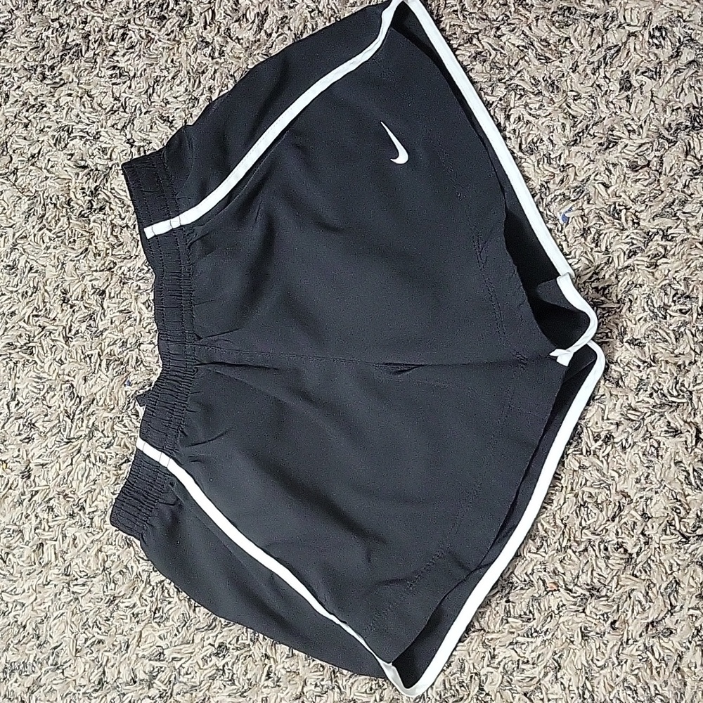 Nike Dri-Fit Shorts.   Size M.   Black with White Trim.   Never worn.